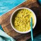 Healthy bowl of soup on a wooden block